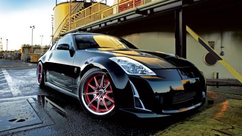 Black Nissan 350Z in an industrial setting